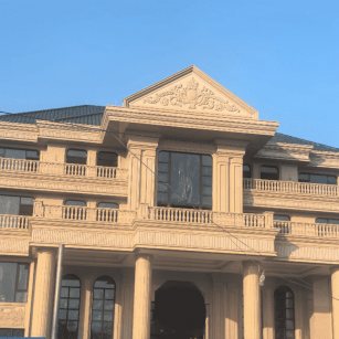 浙江黄金麻别墅外墙干挂石材效果示例