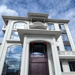 浙江白麻别墅外墙干挂石材效果示例