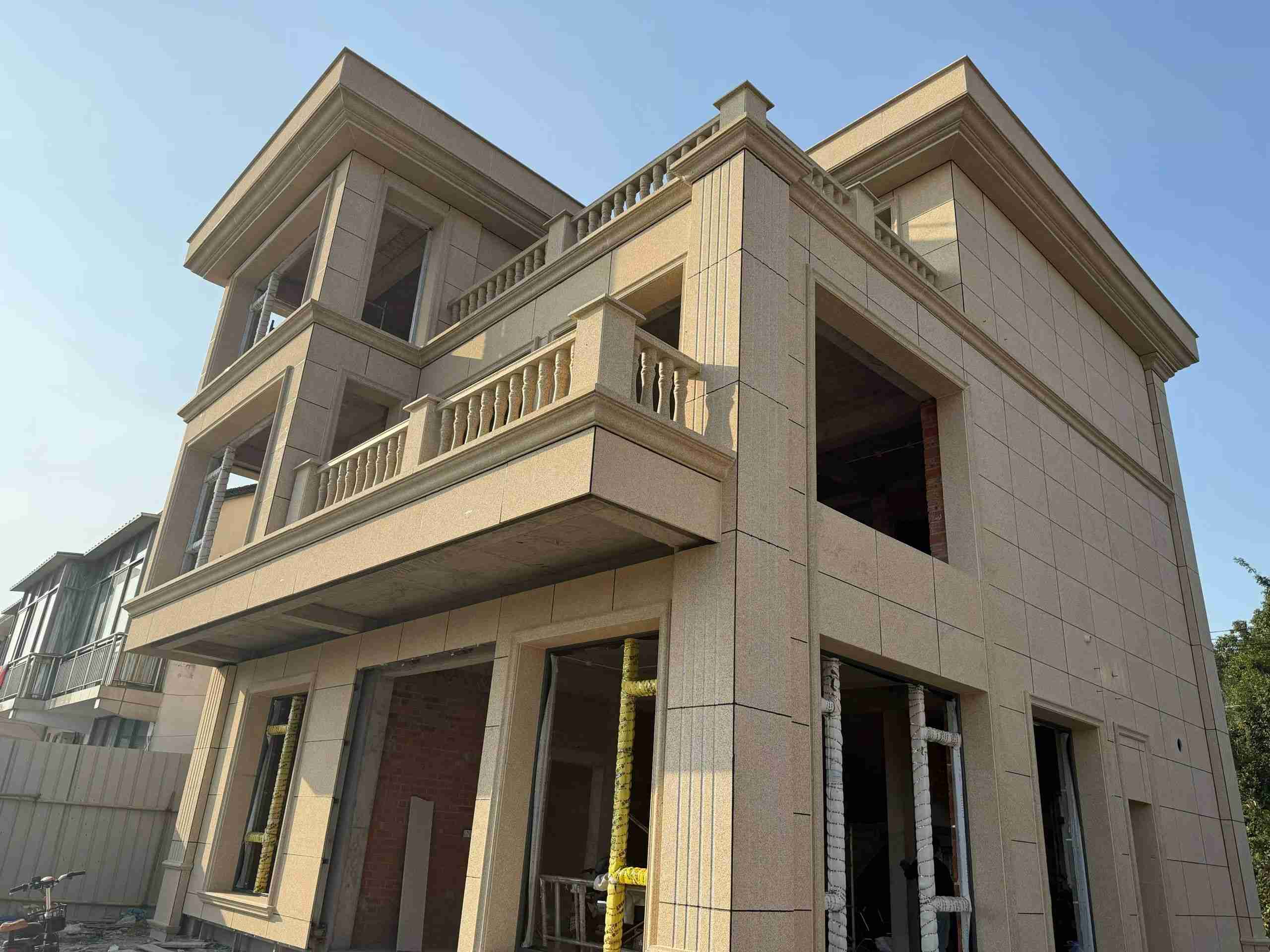 浙江 黄金麻花岗岩石材荔枝面外墙干挂效果展示