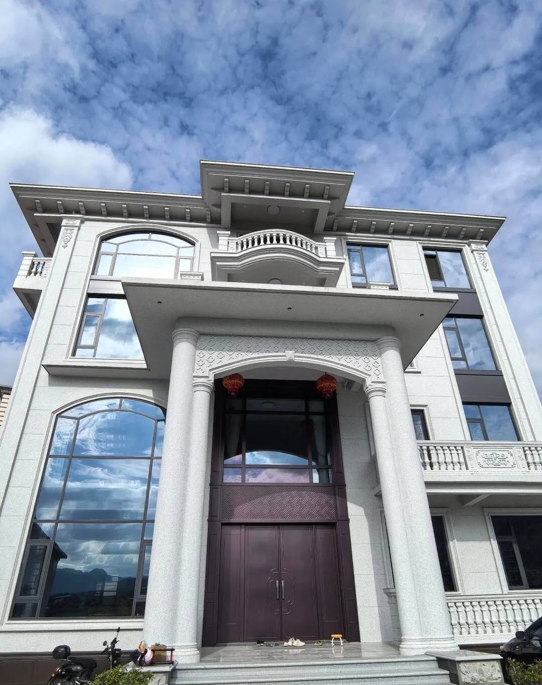 浙江白麻别墅外墙干挂石材效果示例